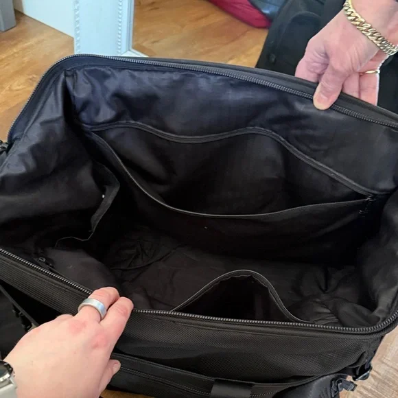 Tumi black travel bag/carryon